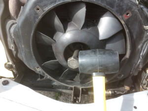 Specialist tools in use removing a 2CV fan