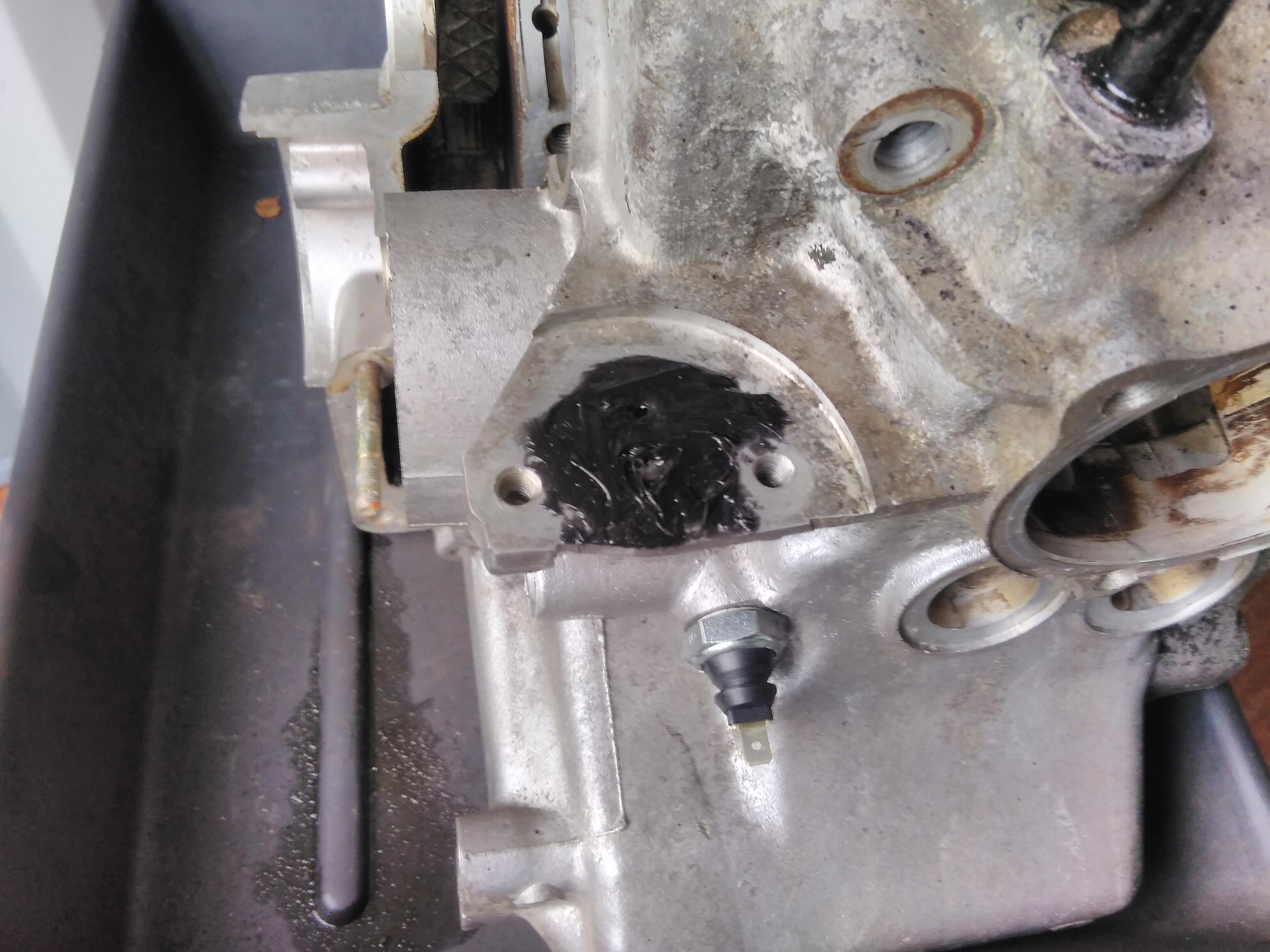 2CV fuel pump mount with silicone sealent