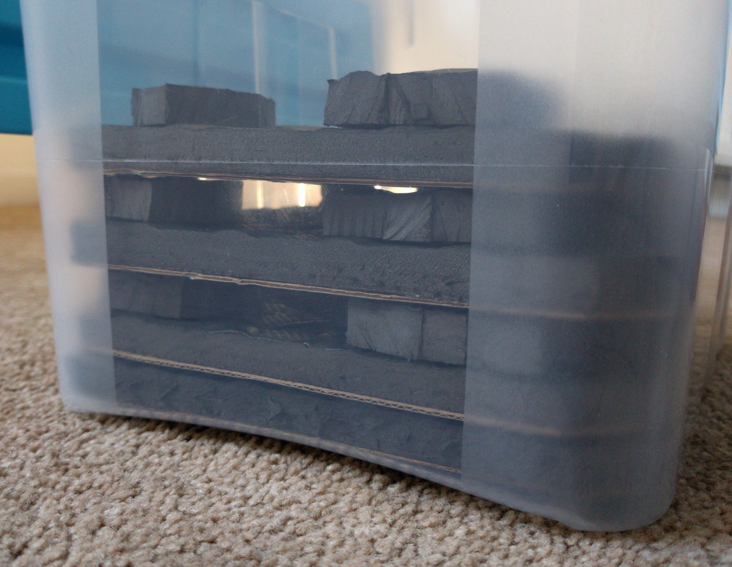 Storage trays stacked in box