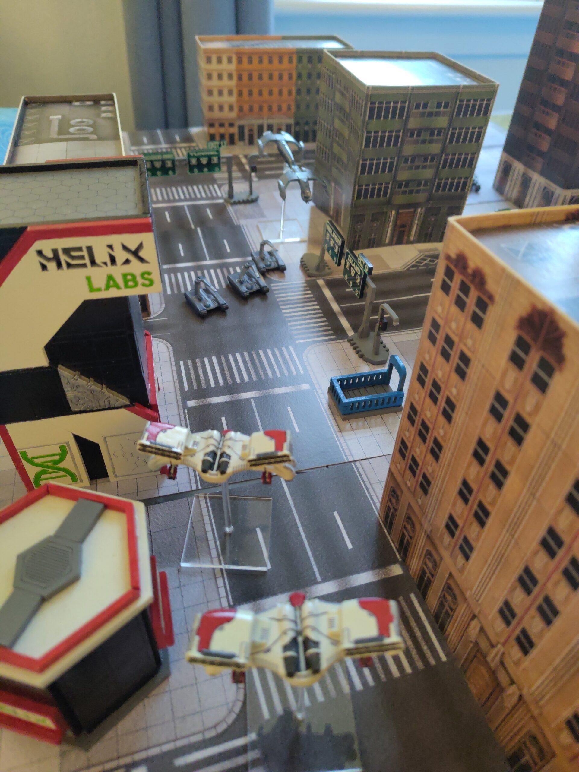 PHR Triton Light Dropships with Aether Hive Nanomachines close in on UCM Sabre Tanks down a city street