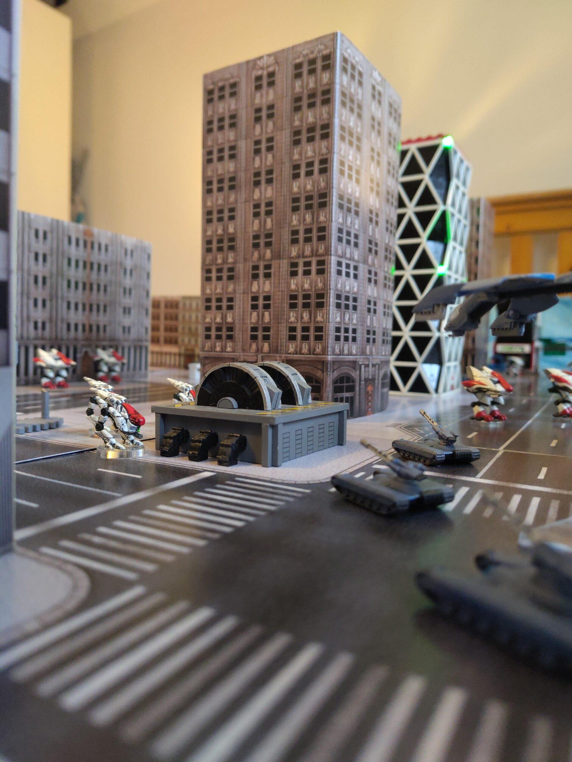 PHR Janus Scout Walkers take up position behind a generator with Menchit Walkers in the background and UCM Rapier AA Tanks in the forground
